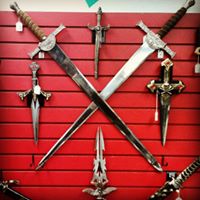 Photo of decorative medieval swords on our wall